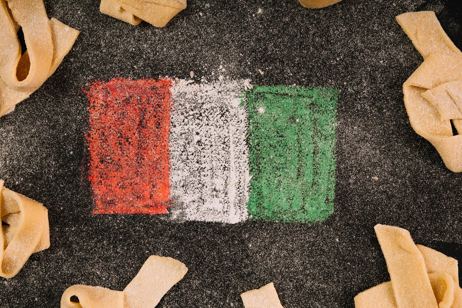 Desenho de giz da bandeira da Itália, representando visto italiano